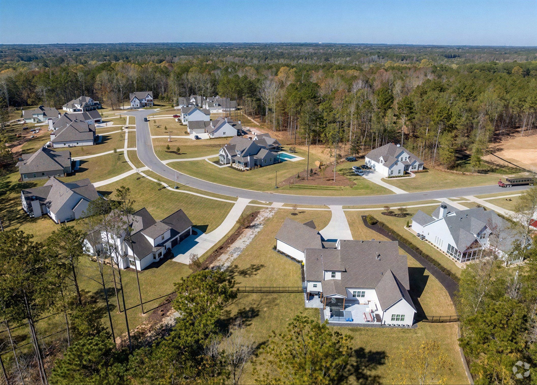 Aerial view of homes on large wooded lots near Sharpsburg, GA