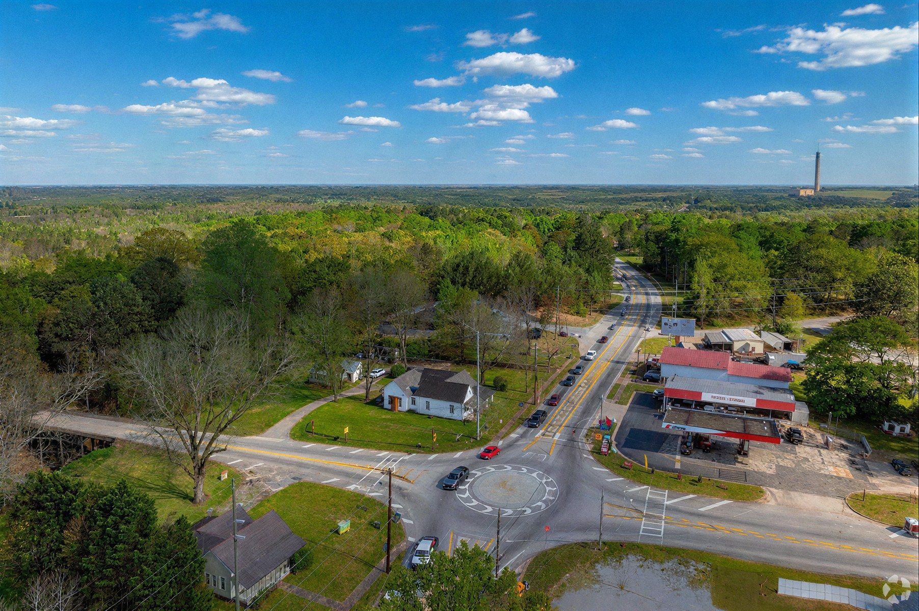 Aerial view of a crossroads and surrounding countryside in Whitesburg, GA